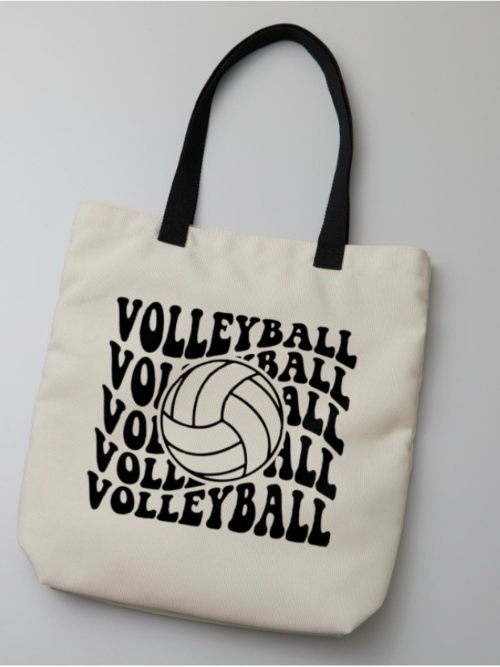 Volleyball Graphic Canvas Tote Bag in Cream and Black 19“ x 14“